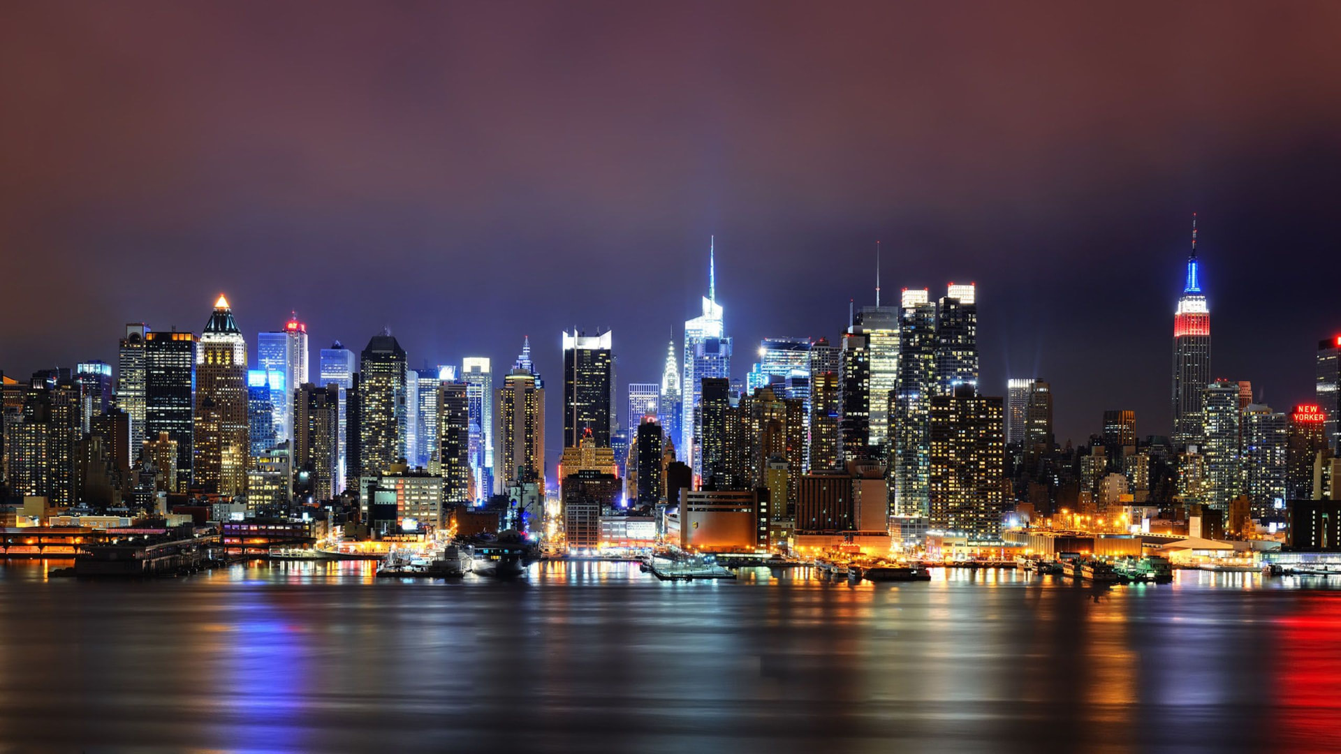 Aerial night view of the Manhattan skyline, part of the New York area Zion Cleaning serves